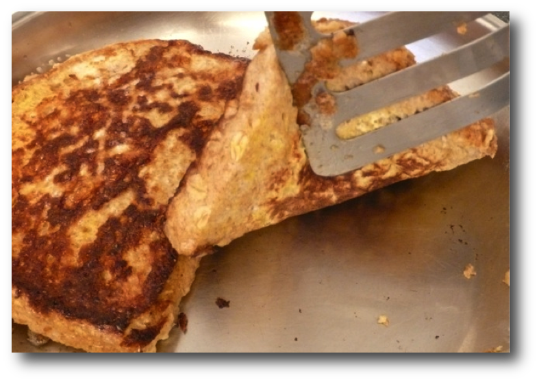 French toast cooking in a frying pan