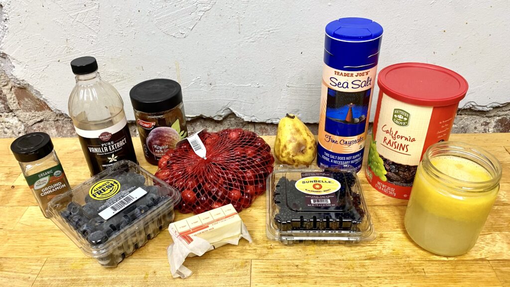 Ingredients to make an improvised warm pear, cranberry, blueberry & blackberry fruit topping