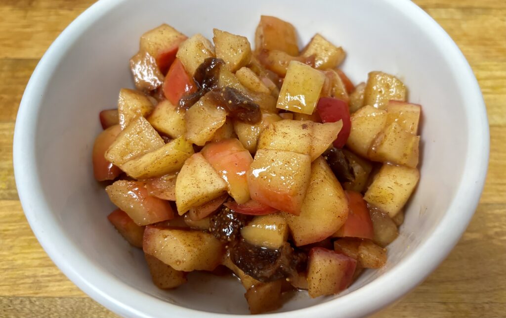 warm apple fruit topping in a serving bowl with links to picture book recipe directions 