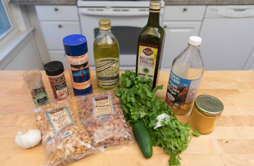 Ingredients needed to make nutty cilantro pesto with link to full picture book recipe
