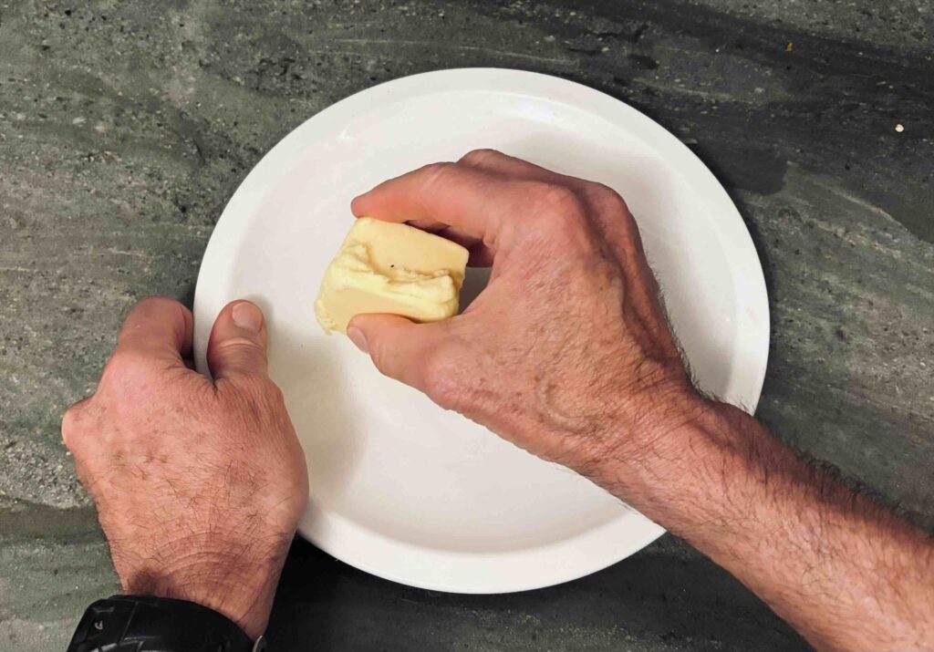 Using butter instead of cooking spray to grease plate